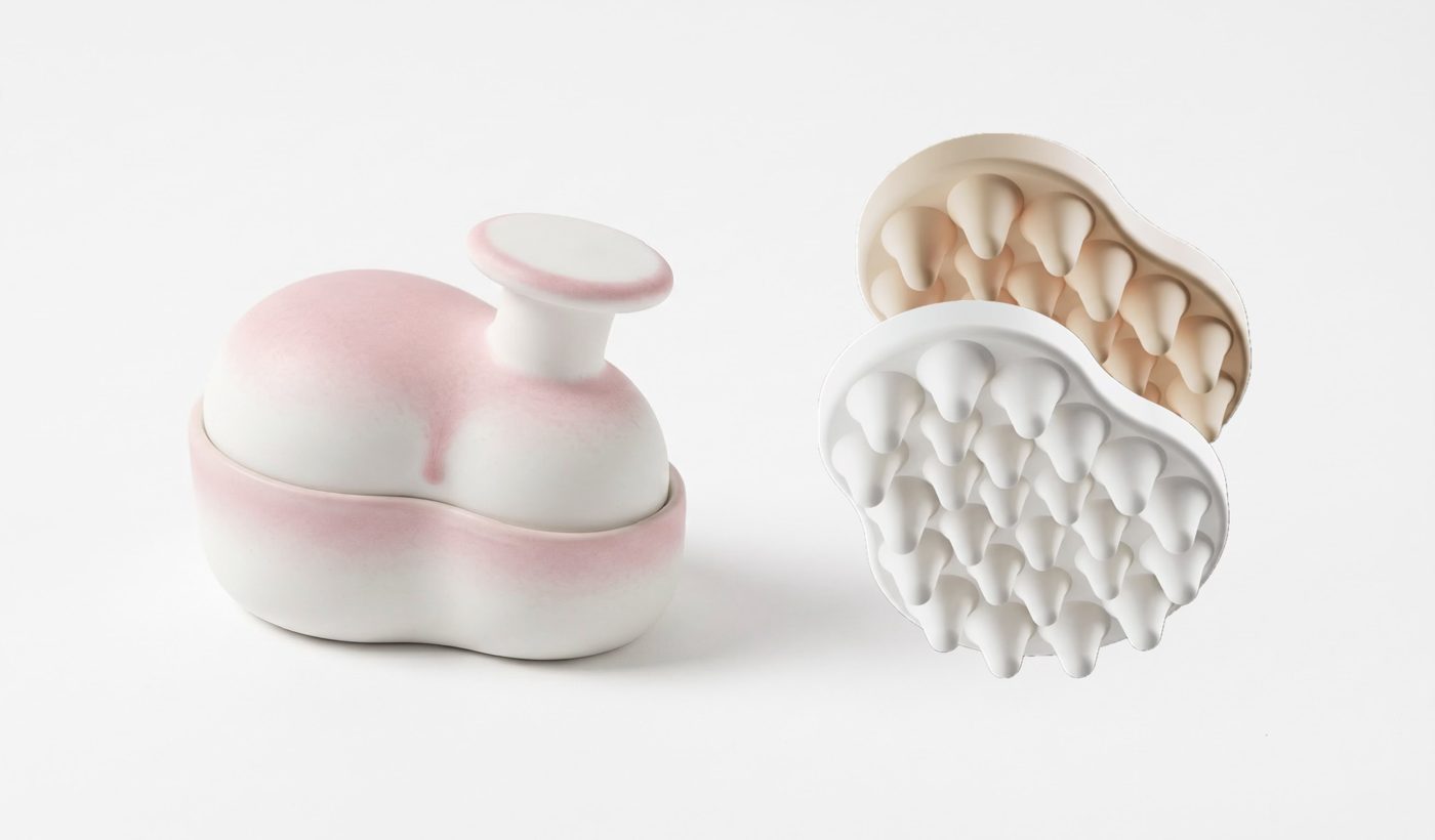 Design-Rendering: Dalera-Griffstück in Rosé mit zwei festen Shampoos